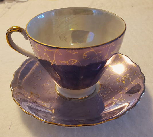 Iridescent Blue and Gold Tea Cup and Saucer